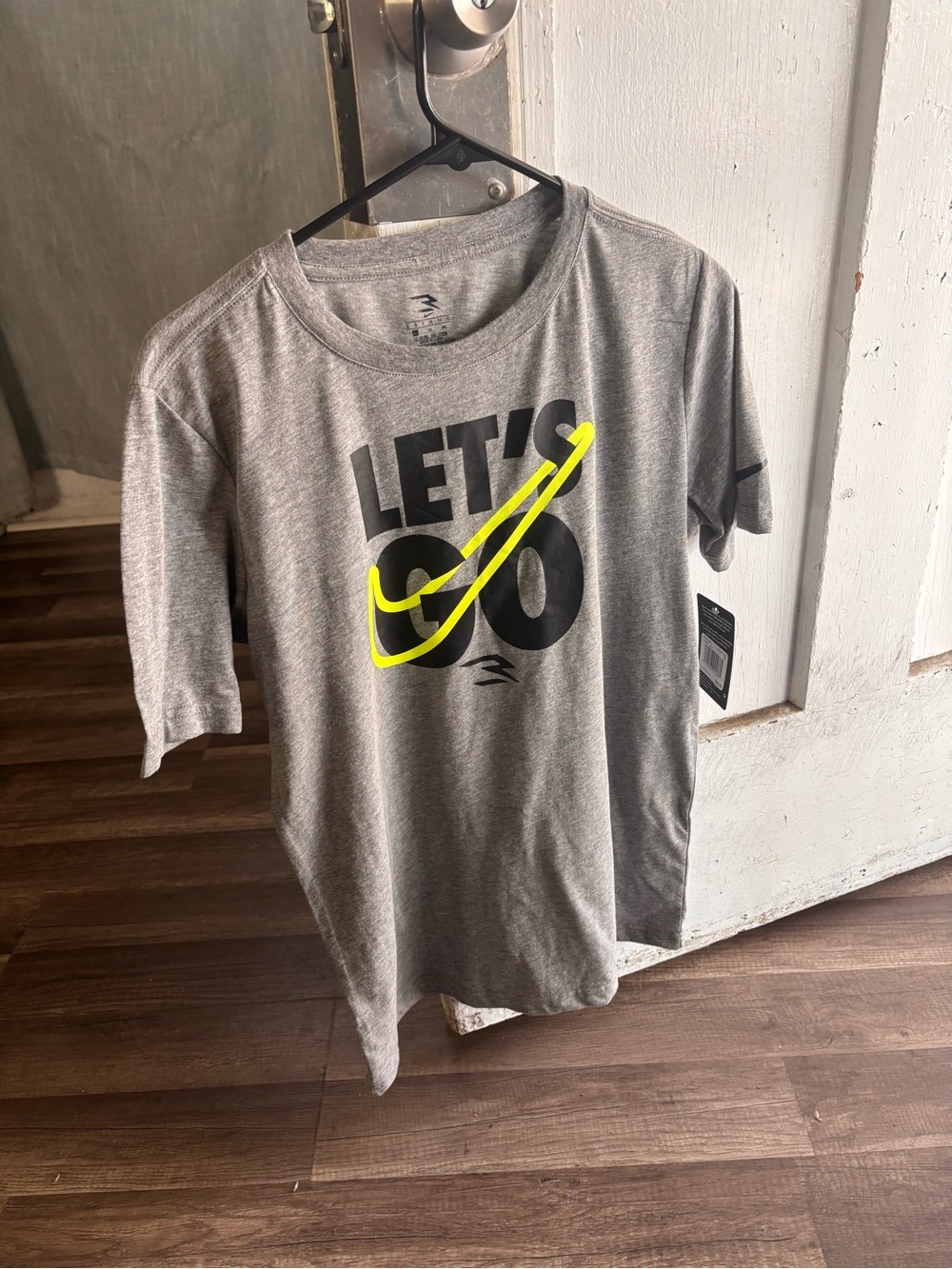 Nike Men's Heather Gray Graphic Tee with Neon Yellow Swoosh